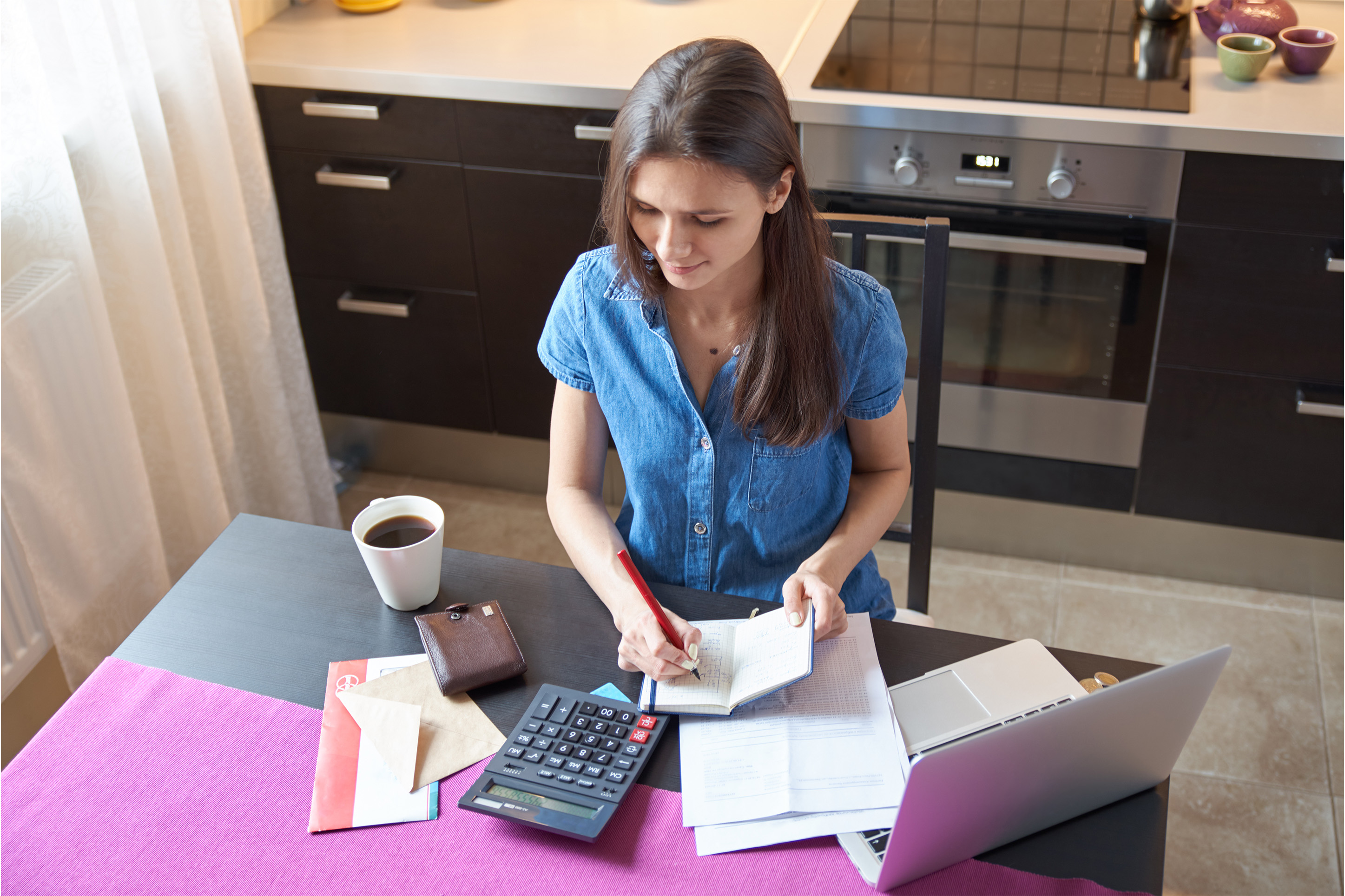 Woman working on her finances. 