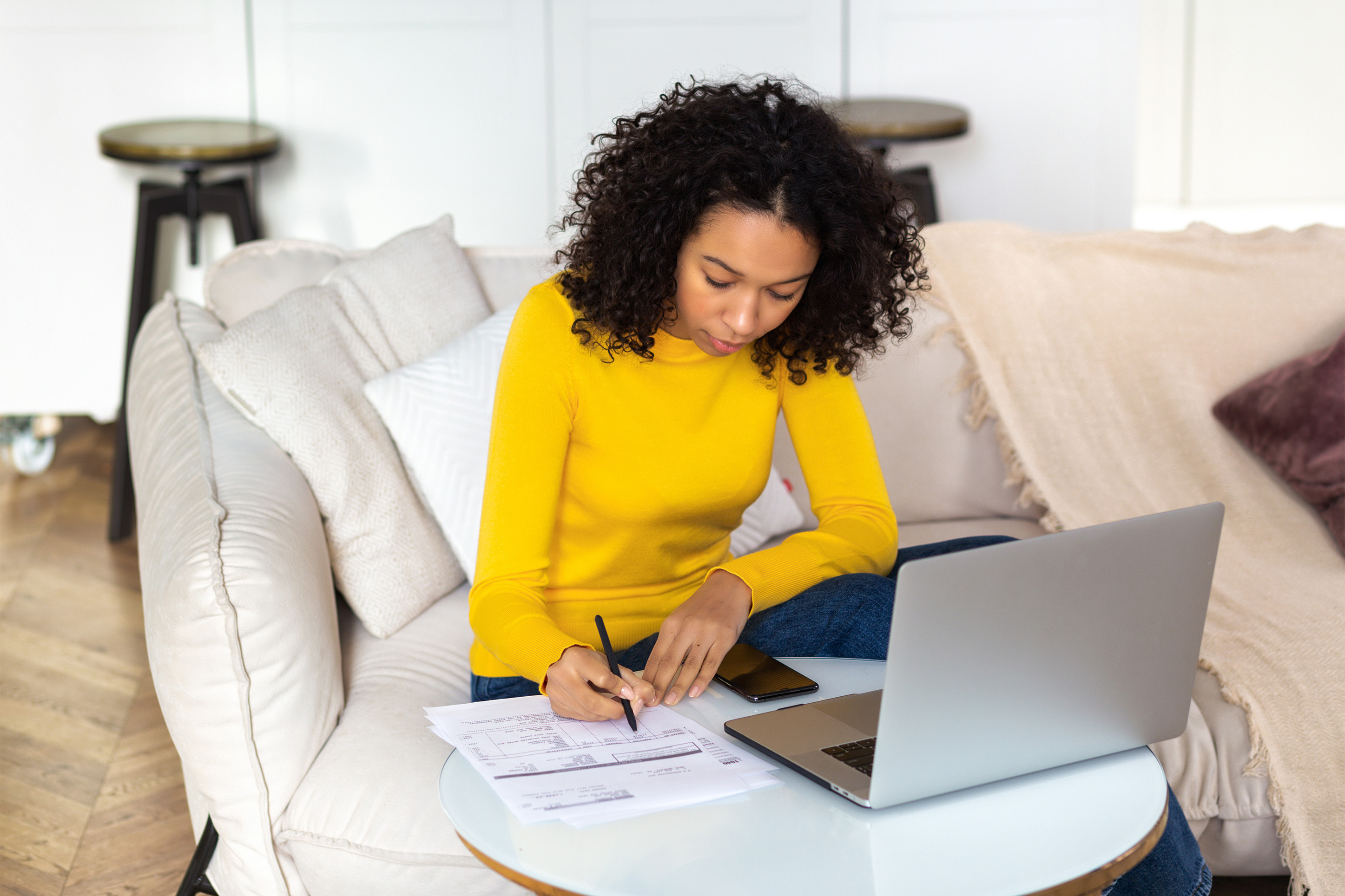 Woman paying bills