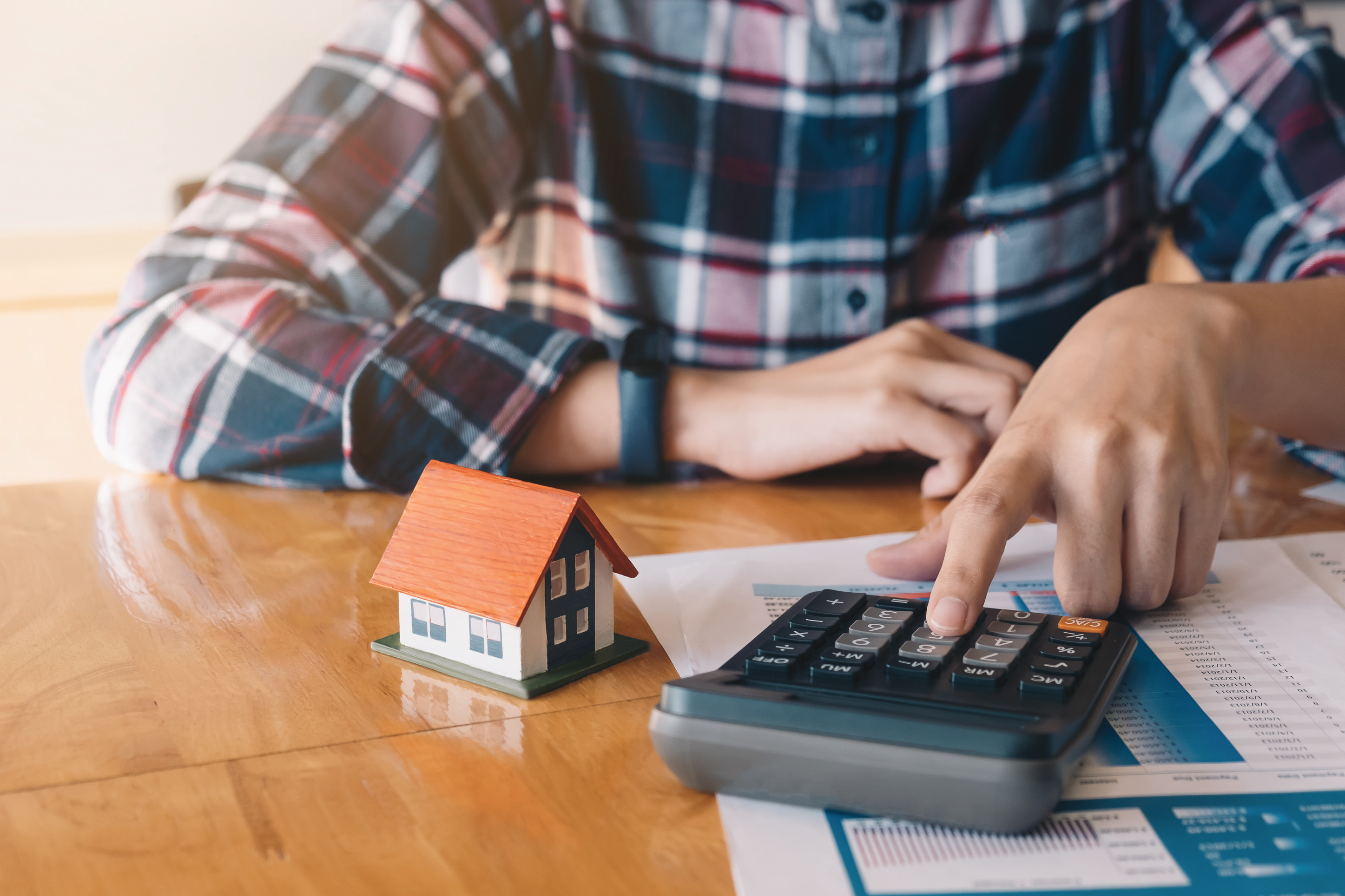 homeowner calculating a mortgage payment