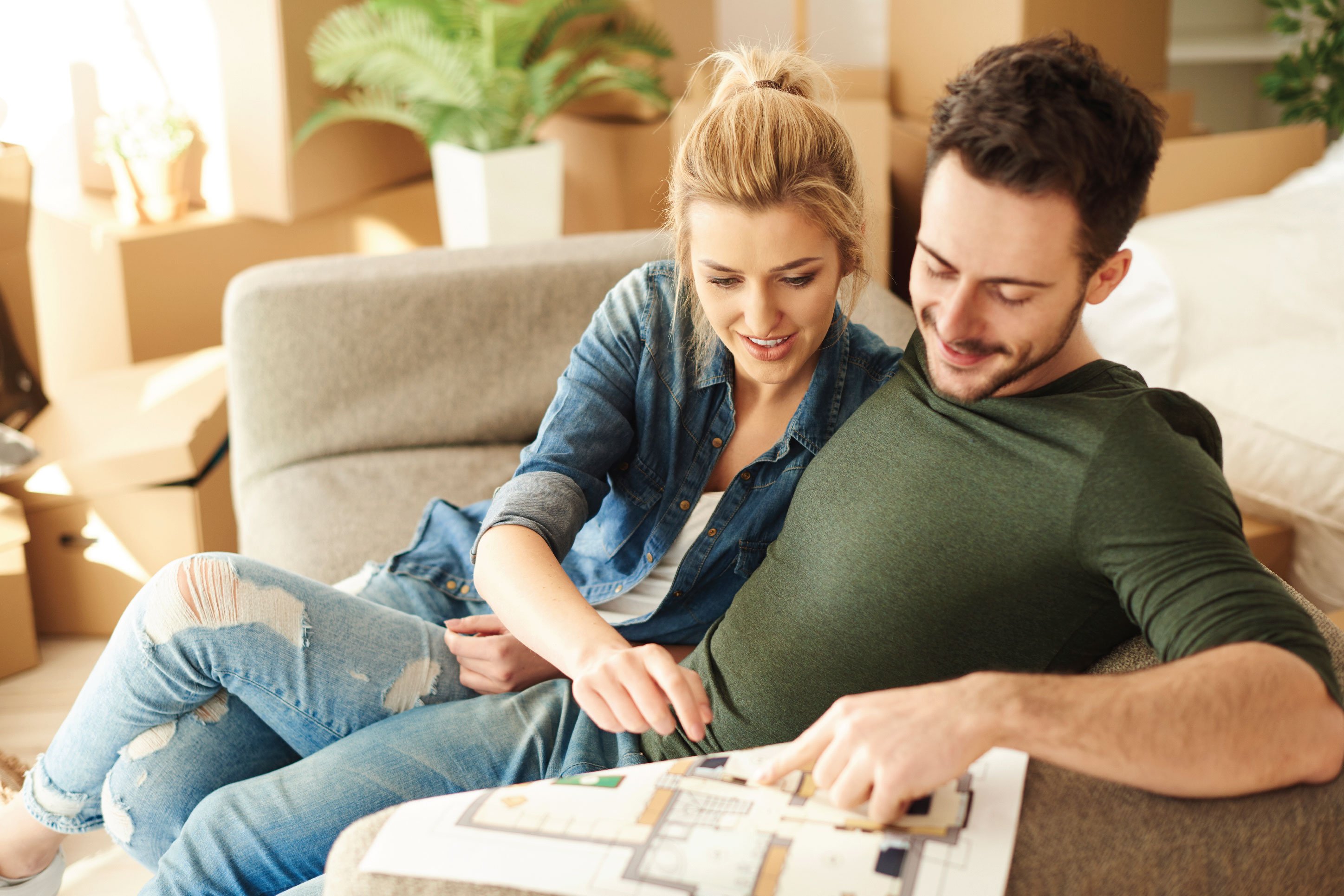 man and woman planning their new house together