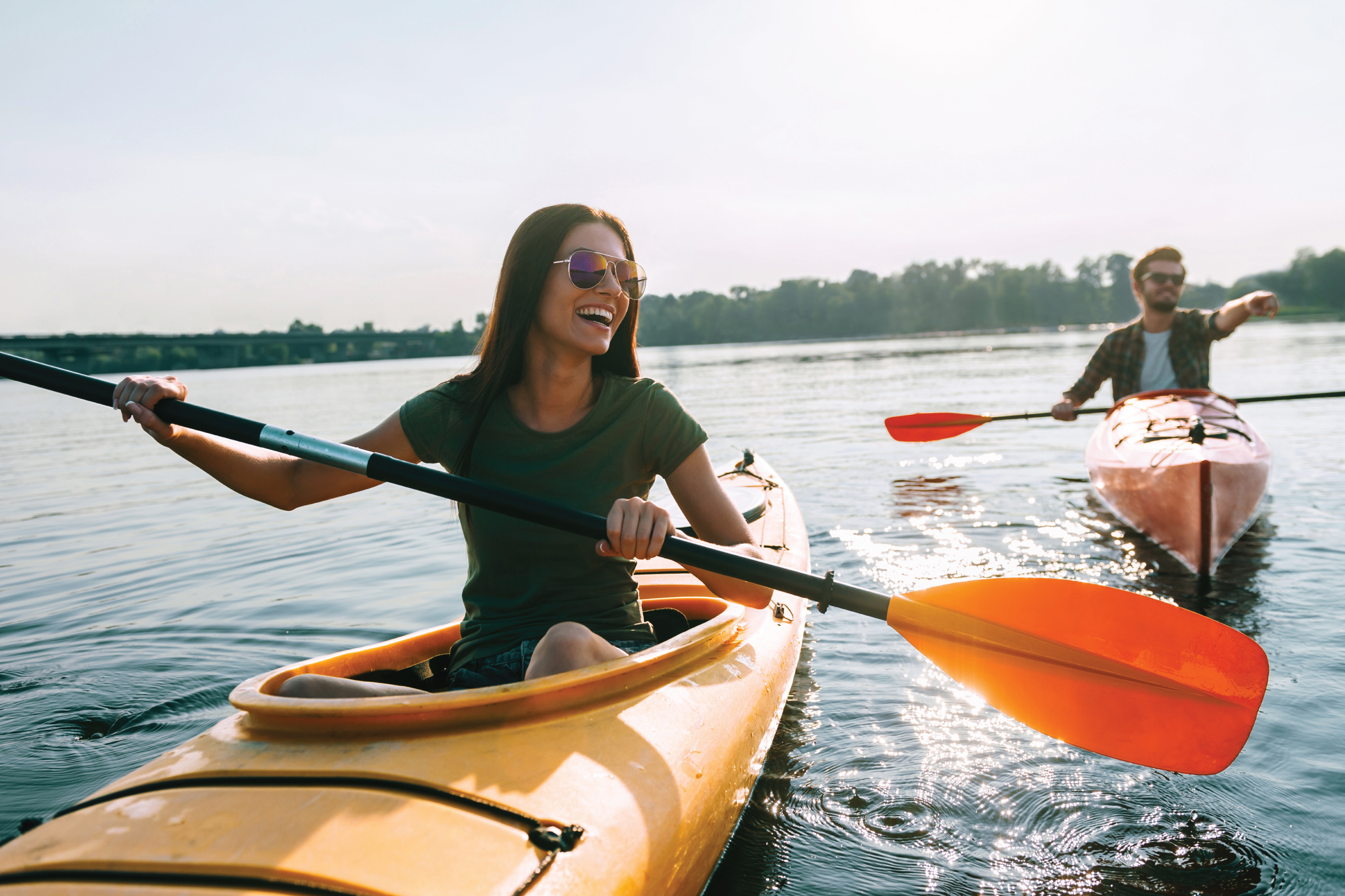 couple kayaking on lake