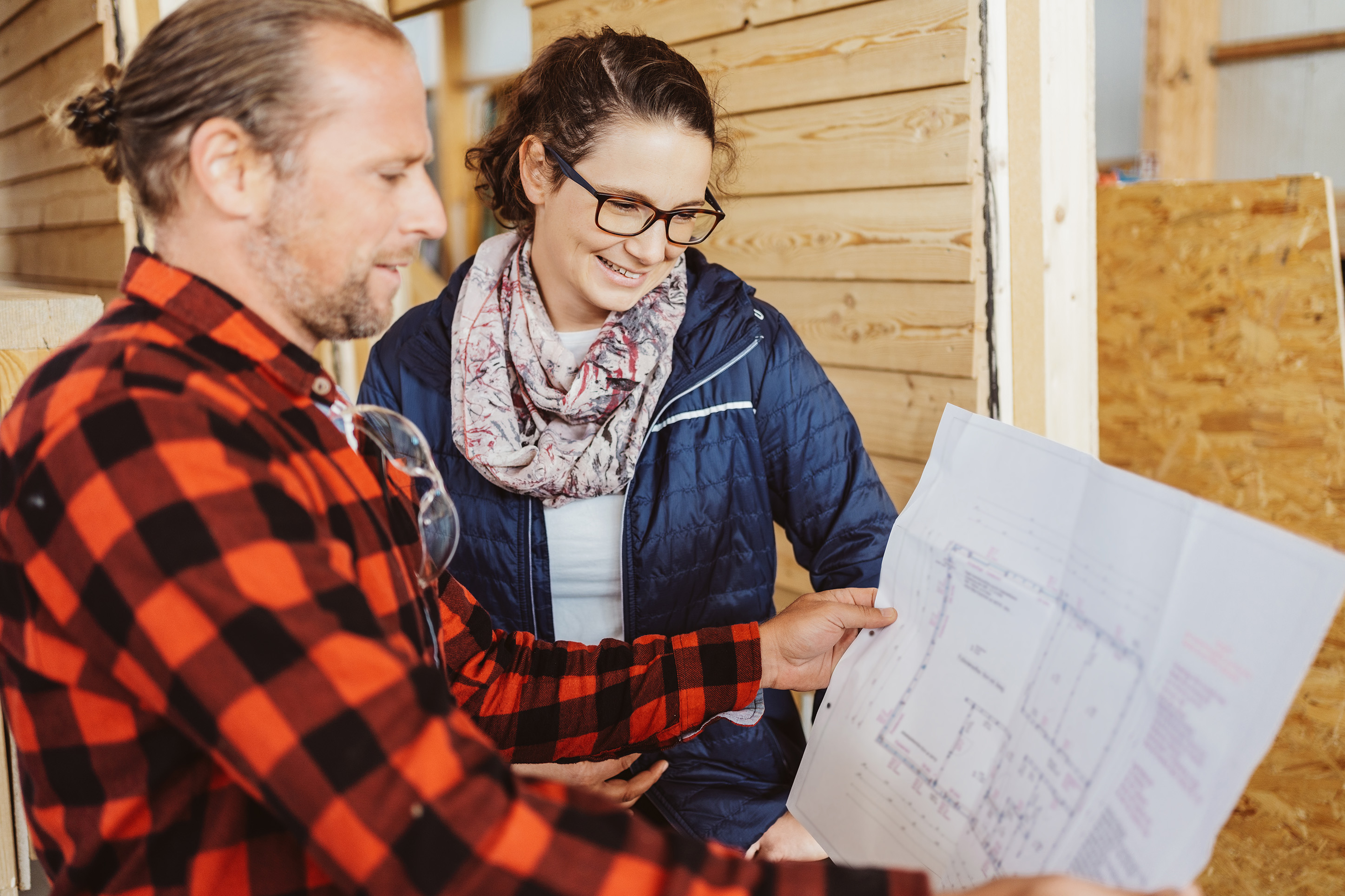 Couple looking at floor plans