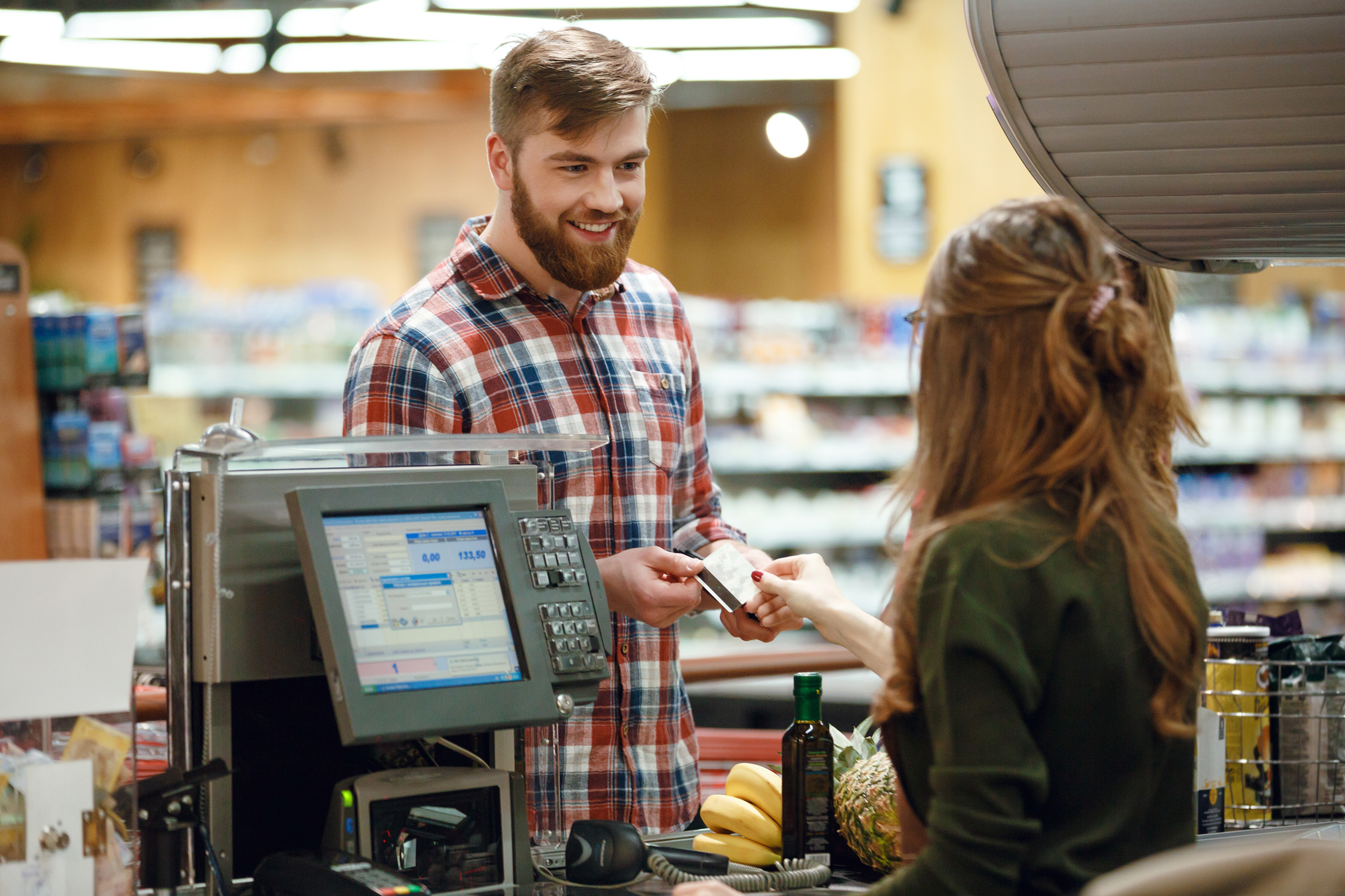 Man purchasing groceries.