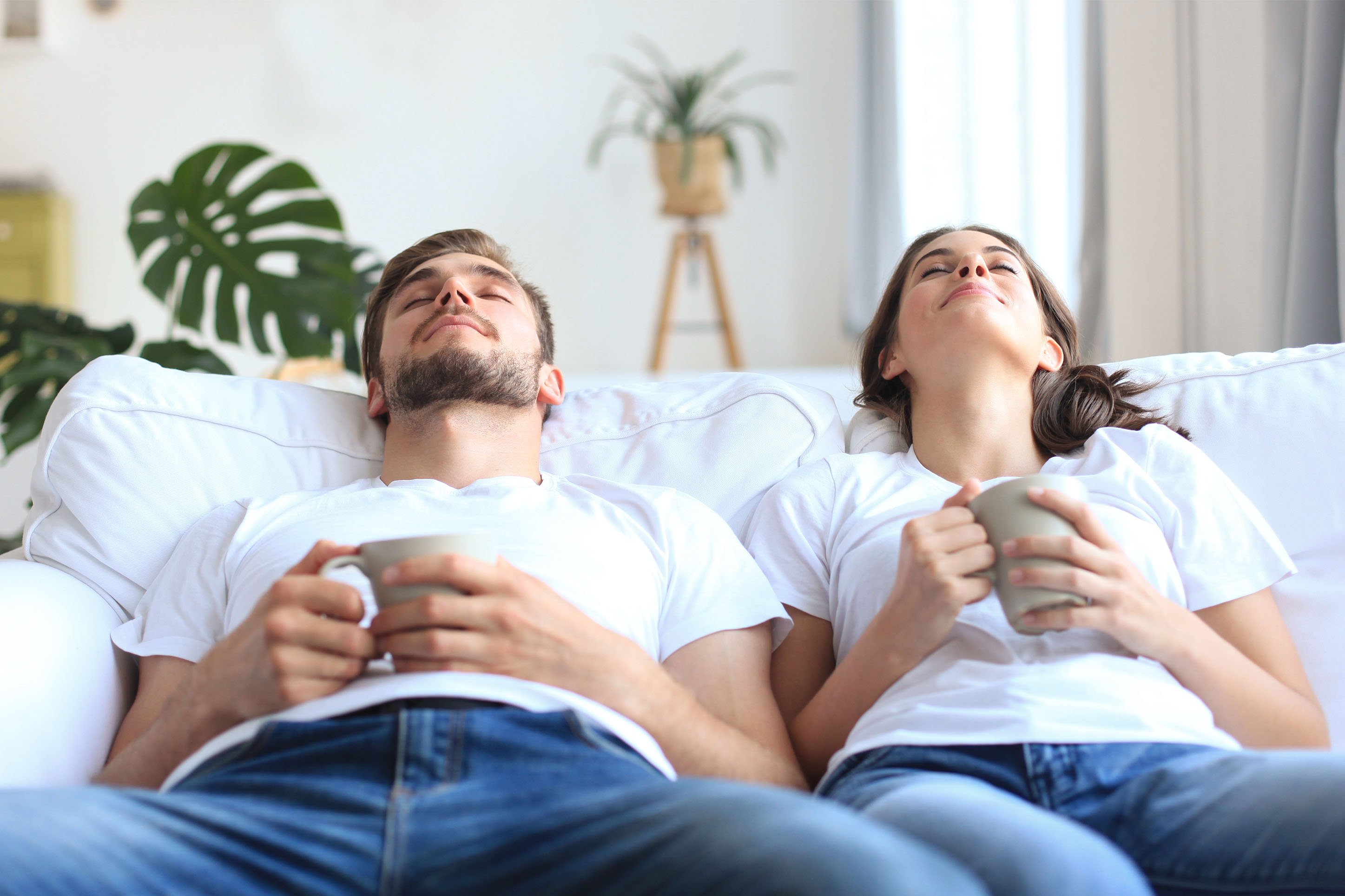 Couple relaxing on couch