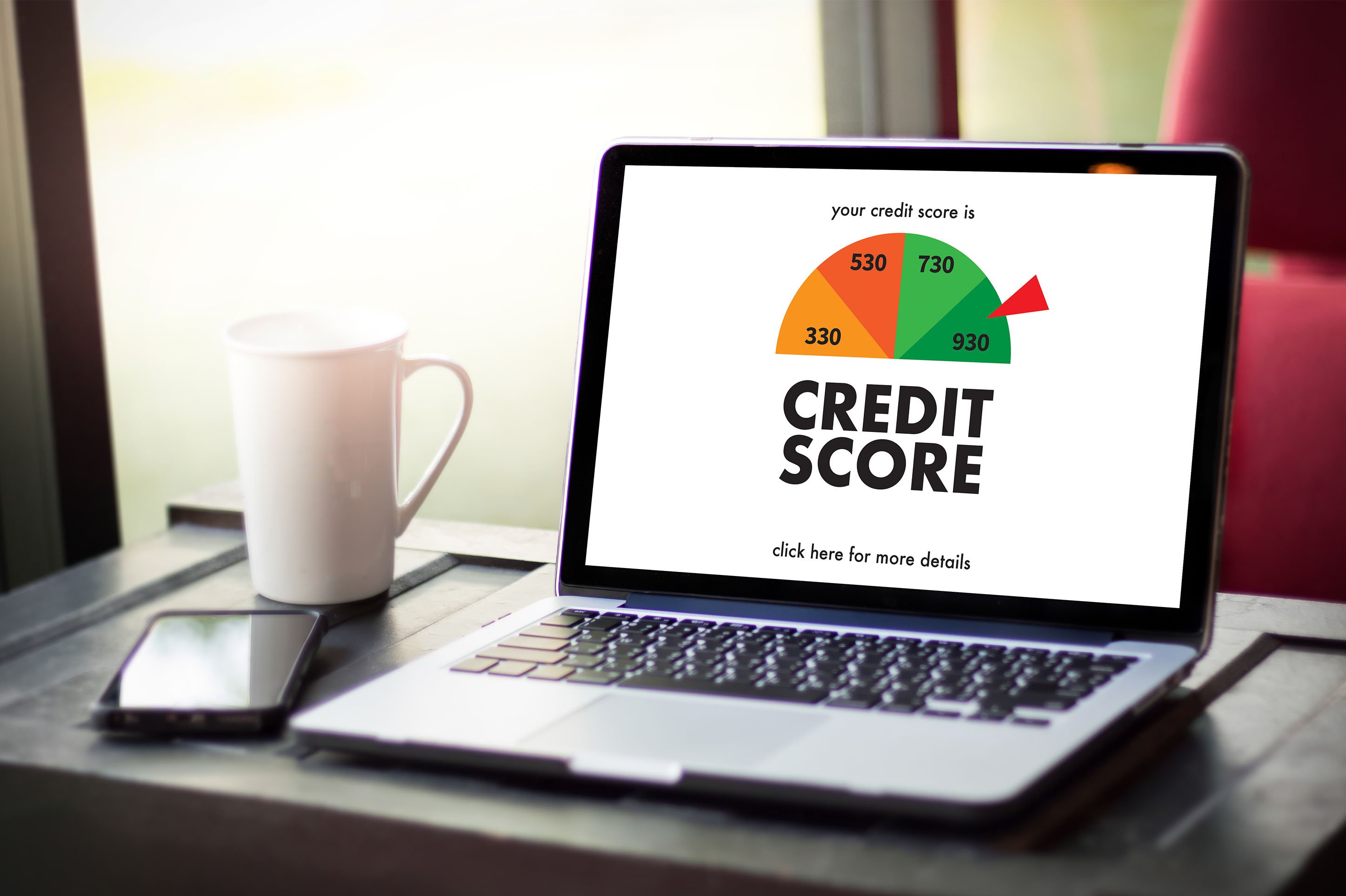 Image of a credit score on a laptop computer. 