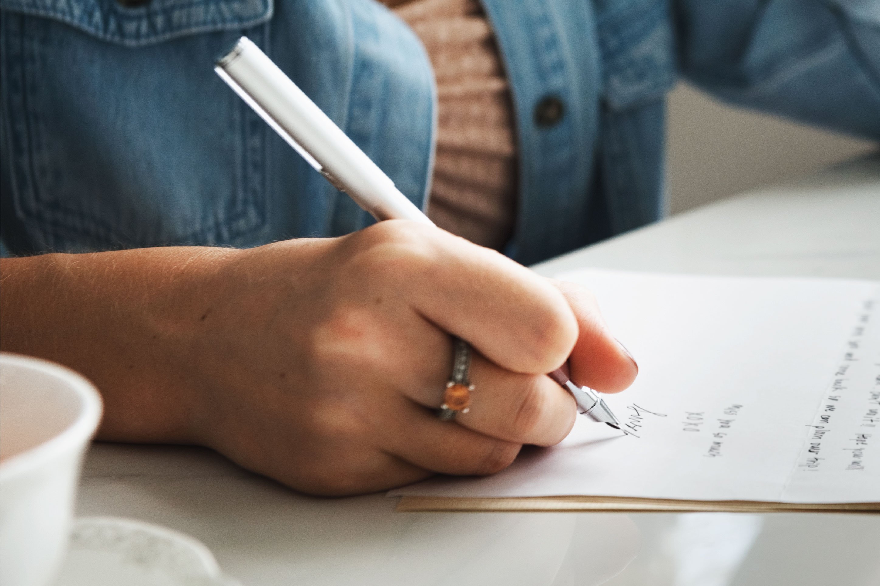 woman writing a personal letter