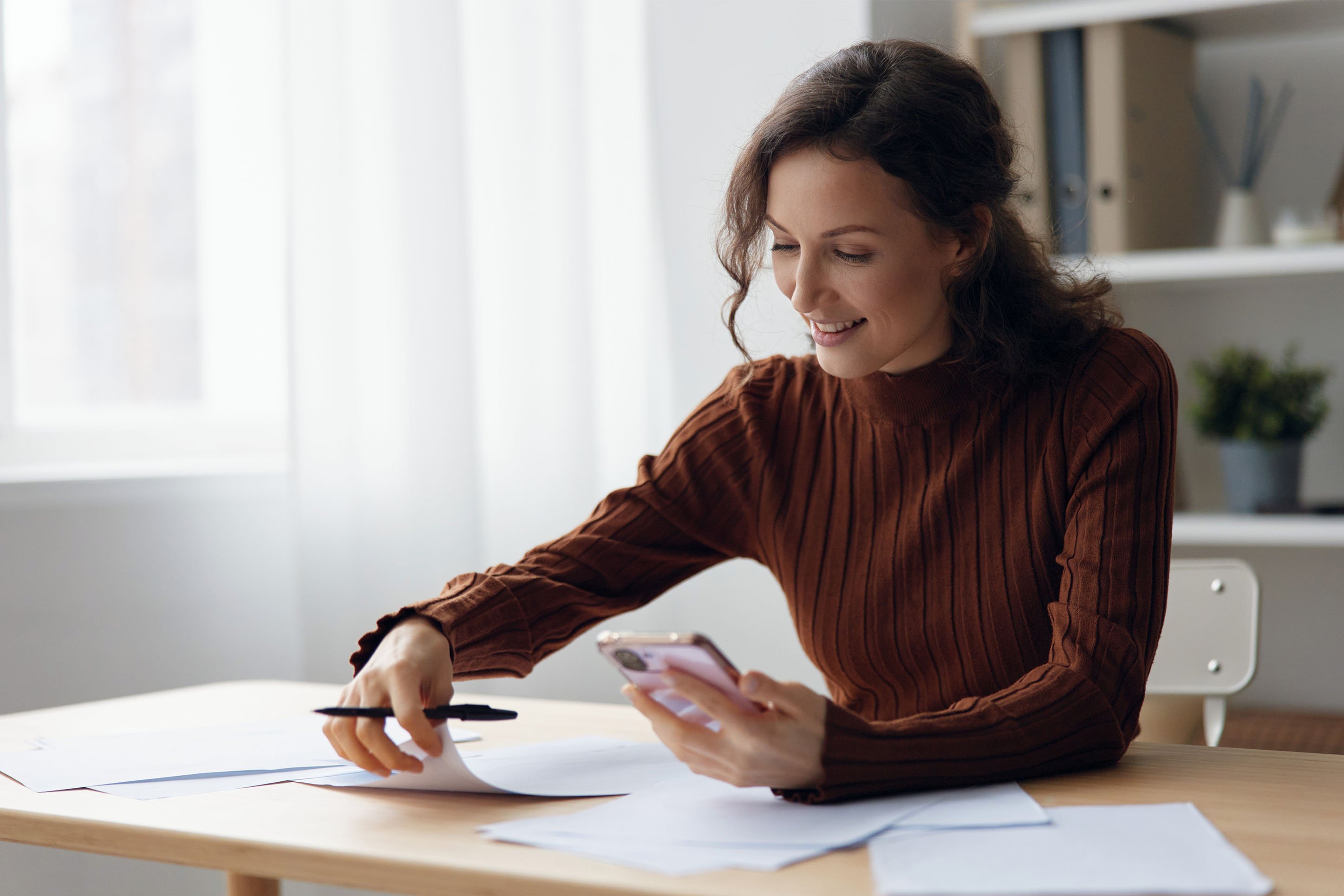 Woman working on her finances.