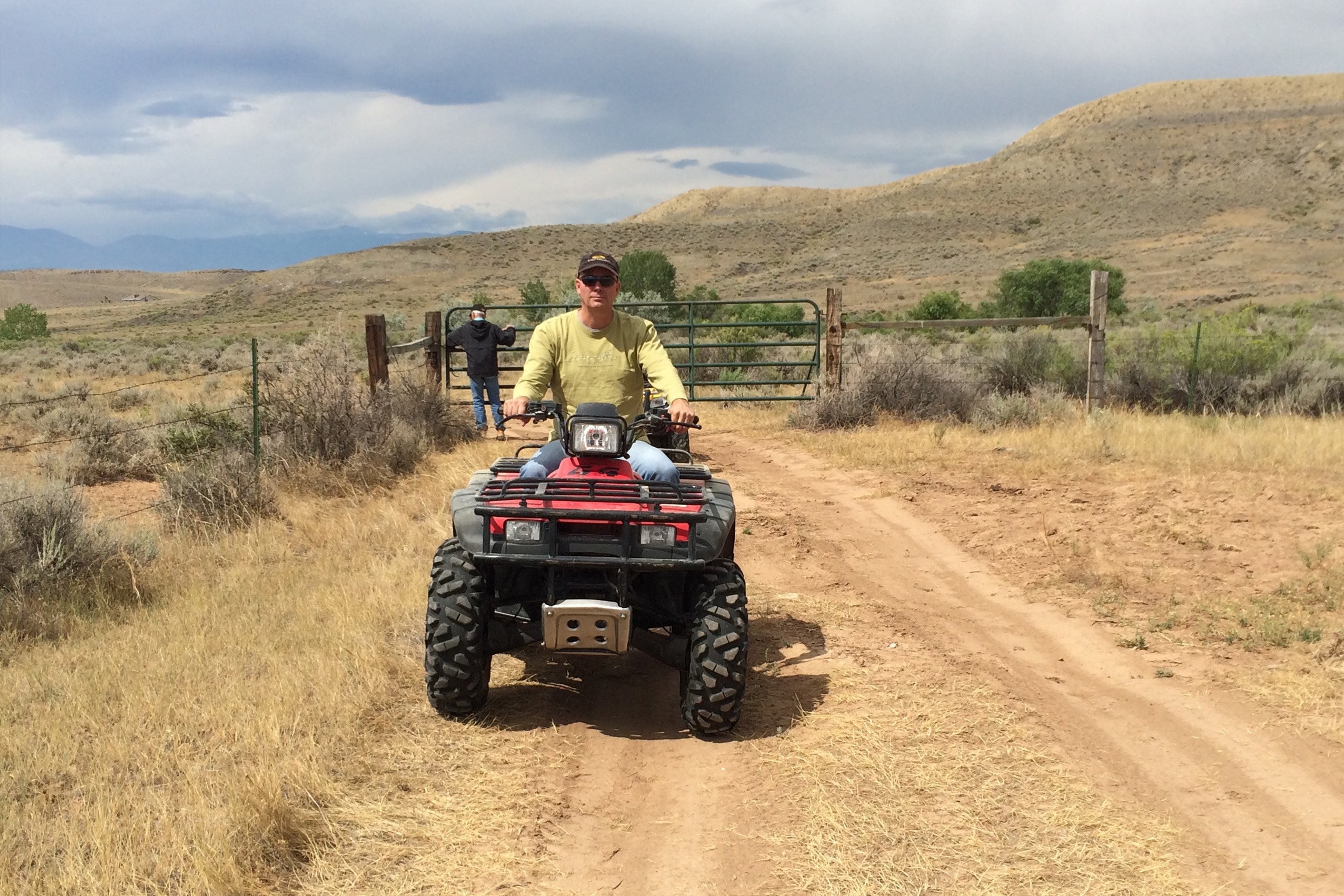 Man on a four wheeler, (ATV)