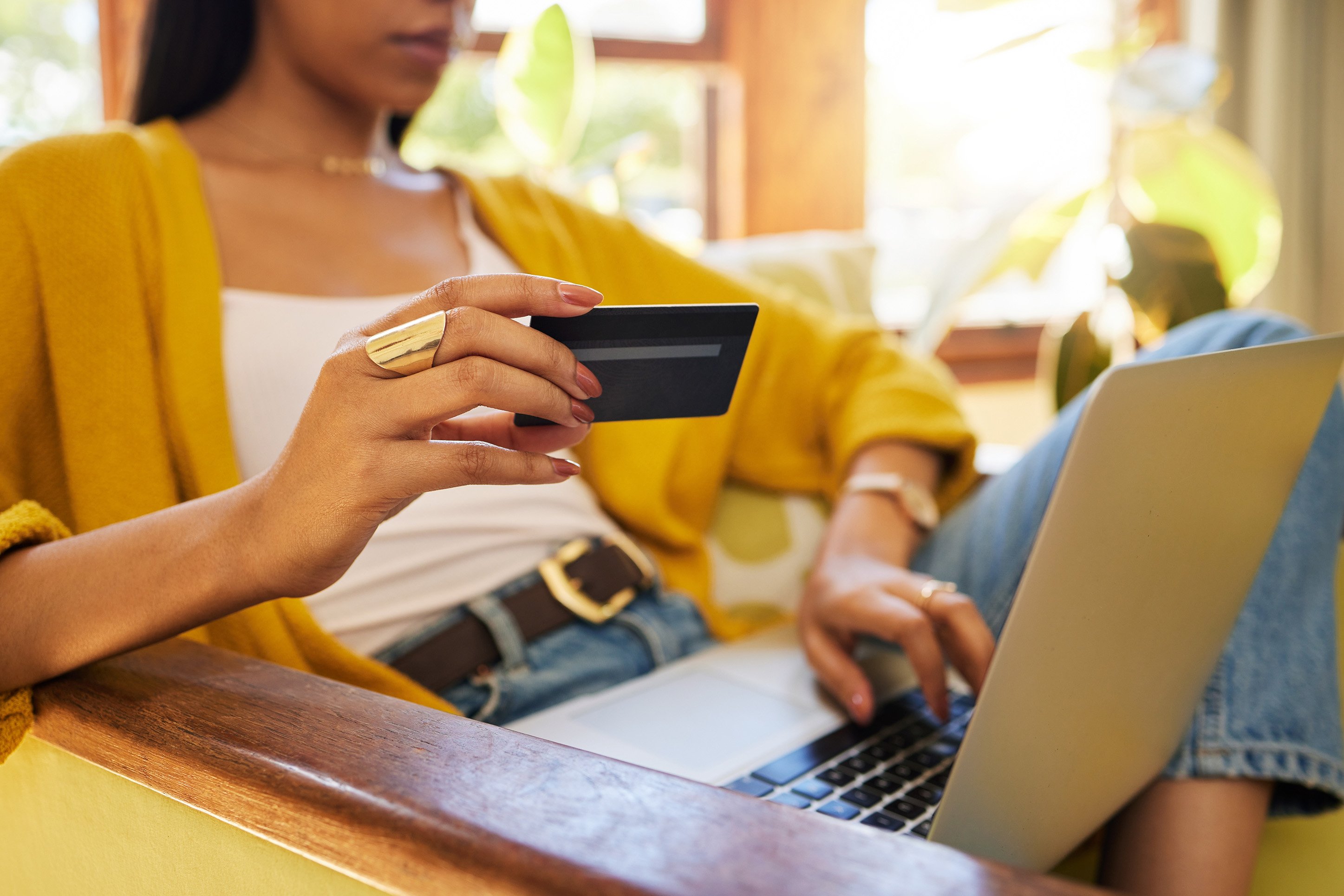 Woman making a purchase through her computer