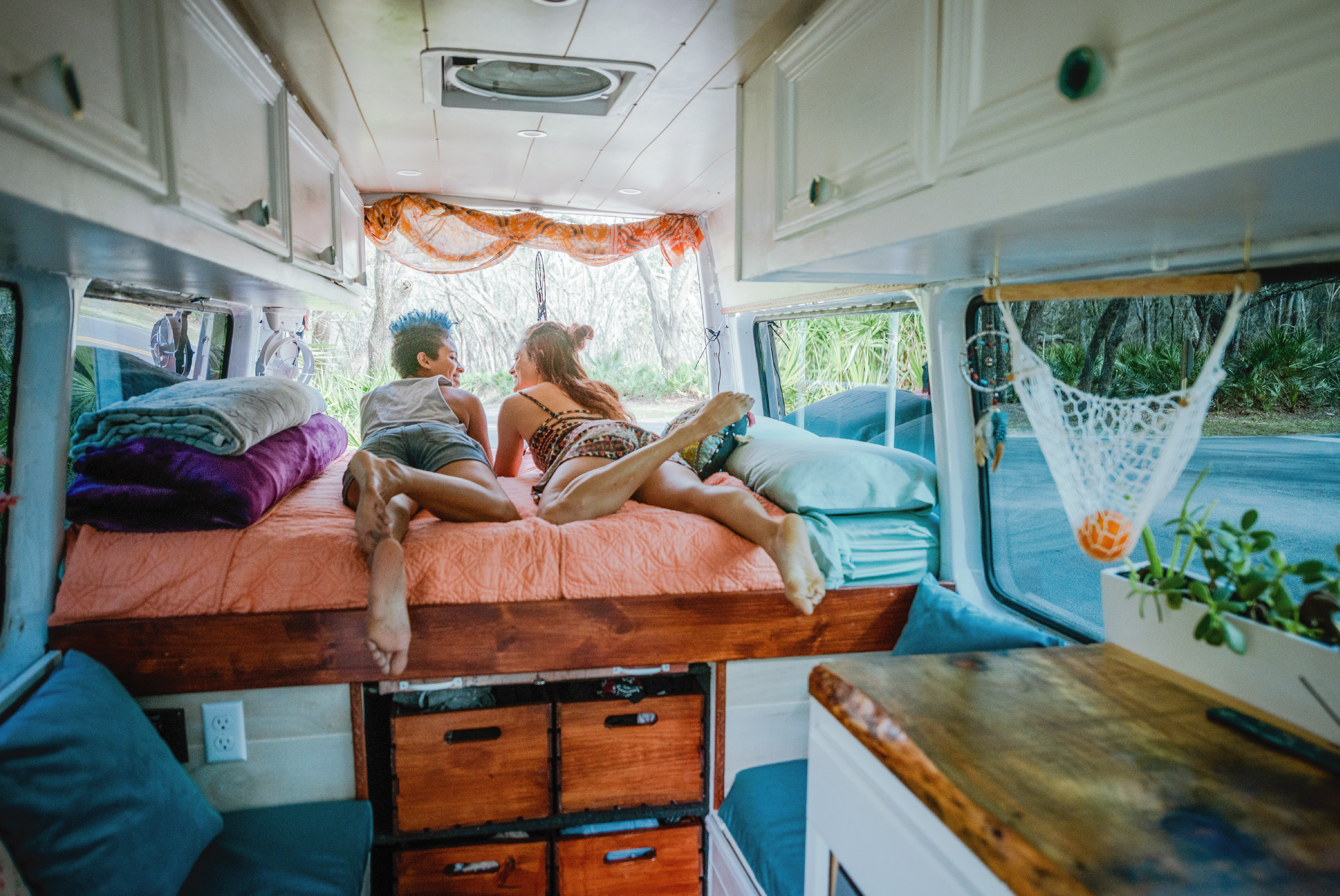 two girls in a camper van